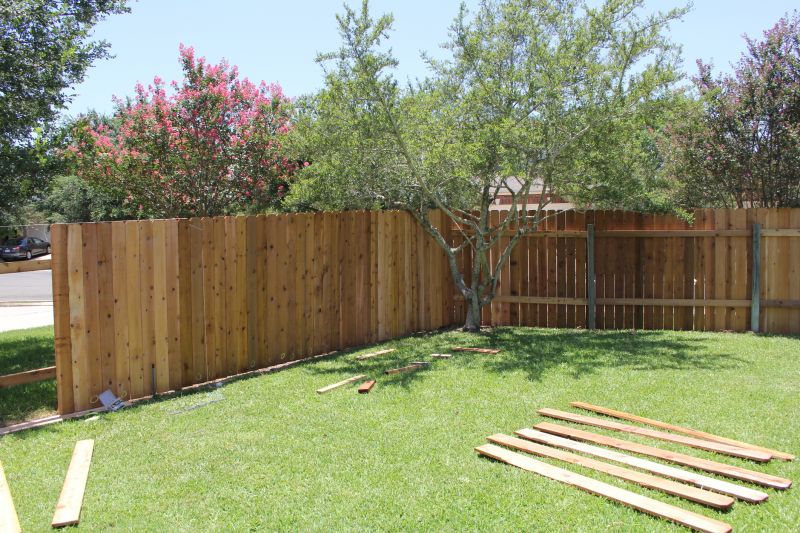 Wood Plank Fence Installation